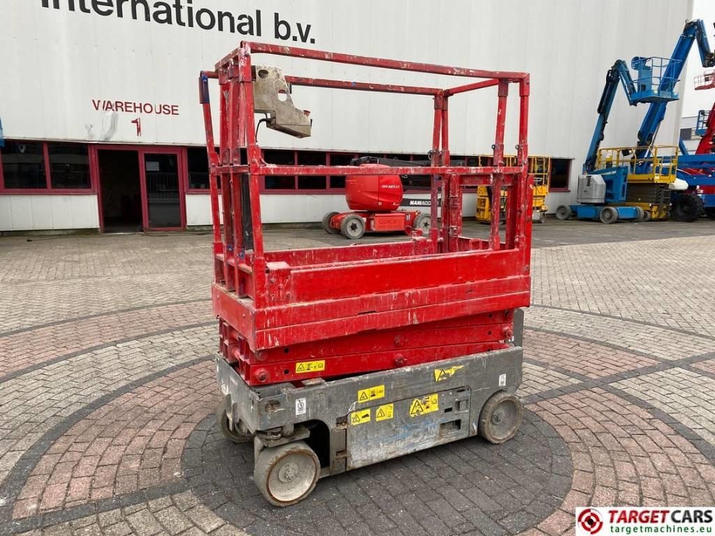 Genie GS-1532 Electric Scissor Work Lift 657cm - Ножничный подъемник: фото 1 Genie GS-1532 Electric Scissor Work Lift 657cm - Ножничный подъемник: фото 1