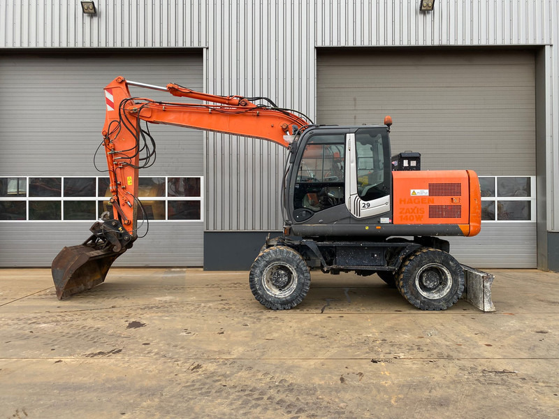 Hitachi ZX140W-3 - Колёсный экскаватор: фото 1 Hitachi ZX140W-3 - Колёсный экскаватор: фото 1