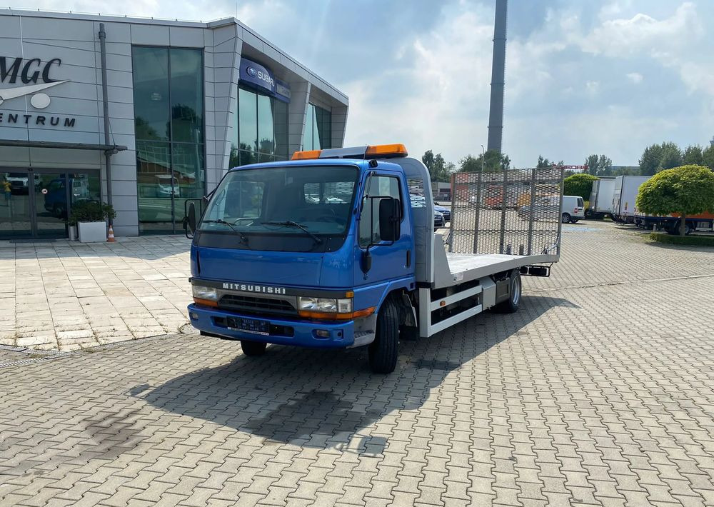 Mitsubishi Canter 75 / PLATFORMA + NAJAZDY / IDEALNY DO MASZYN / NIEZAWODNY SILNIK / HYDRAULIKA / 3 MIEJSCA / MANUAL - Эвакуатор: фото 1
