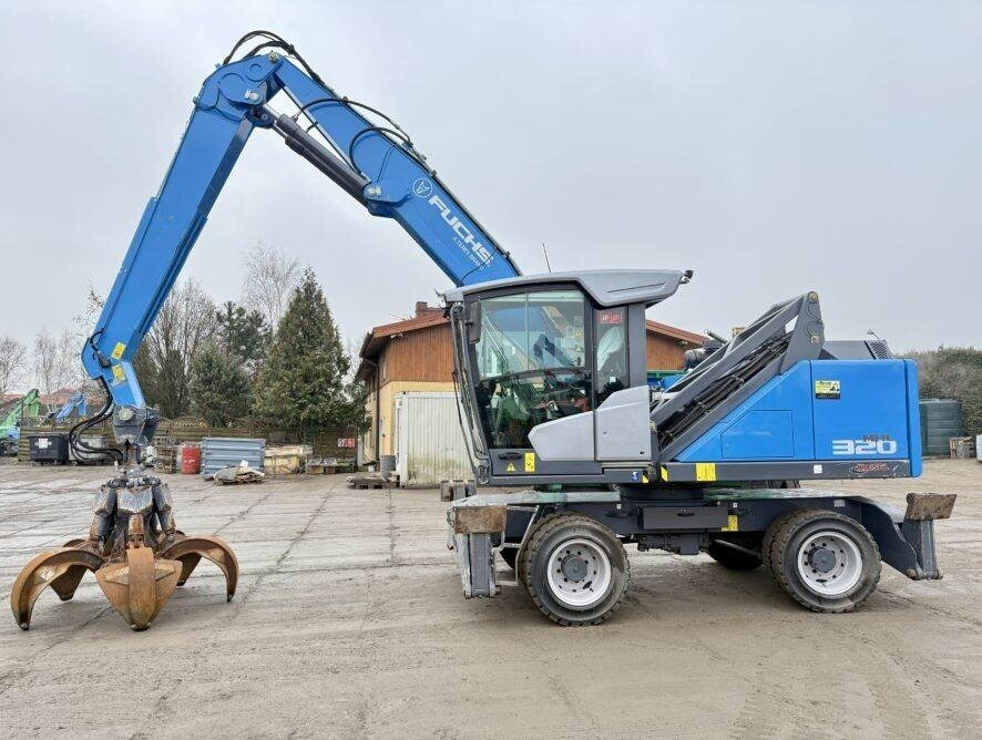 Fuchs MHL320 F  - Перегружатель: фото 1