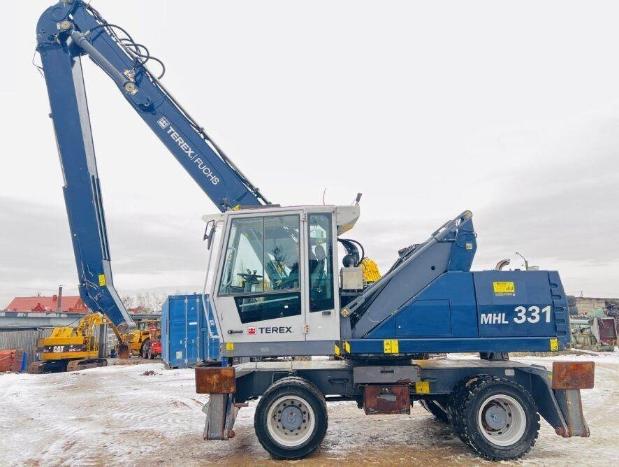 Fuchs MHL331 D HGT grab  - Перегружатель: фото 1