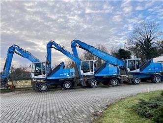 Fuchs MHL335  - Перегружатель: фото 1