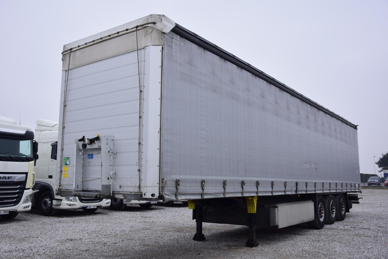 Schmitz Cargobull SCS24/L Lifting Axle - Тентованный полуприцеп: фото 1 Schmitz Cargobull SCS24/L Lifting Axle - Тентованный полуприцеп: фото 1