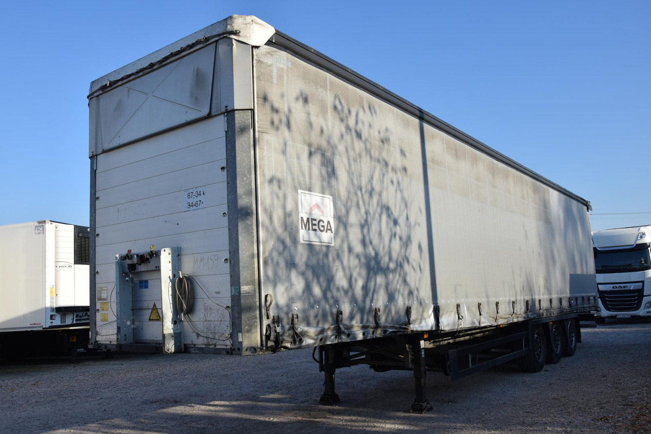 Schmitz Cargobull SCS24/L Varios - Тентованный полуприцеп: фото 1 Schmitz Cargobull SCS24/L Varios - Тентованный полуприцеп: фото 1