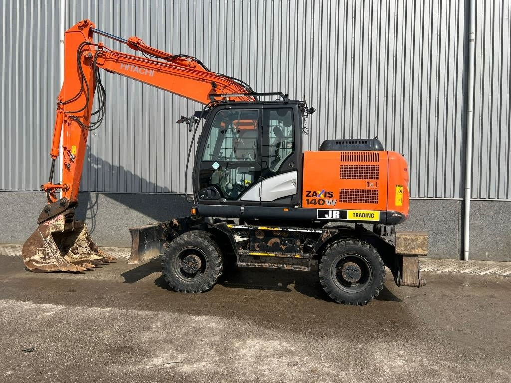 Hitachi ZX 140 W-5 - Колёсный экскаватор: фото 1 Hitachi ZX 140 W-5 - Колёсный экскаватор: фото 1