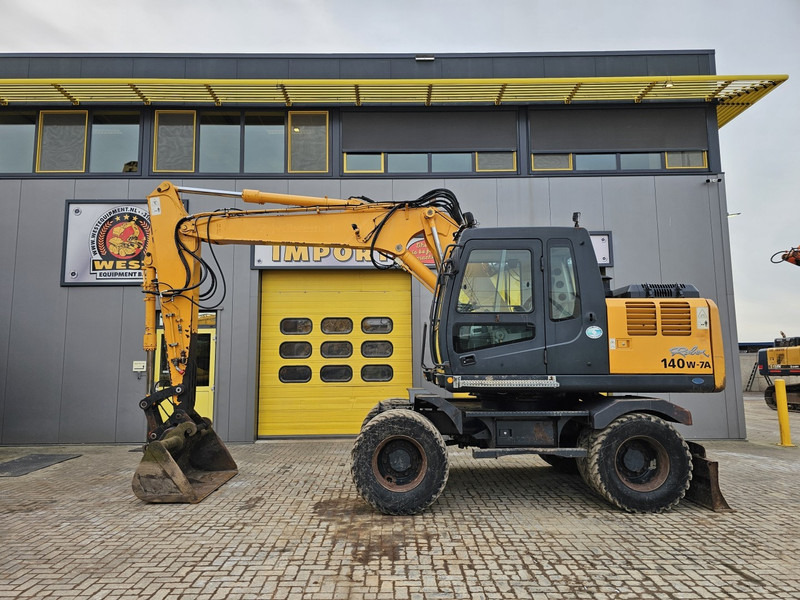 Hyundai R140W-7A - Колёсный экскаватор: фото 1 Hyundai R140W-7A - Колёсный экскаватор: фото 1