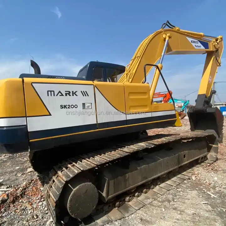 Second Hand Japan Kobelco Sk200-3 Crawler Excavator 99% New Original Imported Kobelco sk200-3 Used Excavator For Sale - Гусеничный экскаватор: фото 1 Second Hand Japan Kobelco Sk200-3 Crawler Excavator 99% New Original Imported Kobelco sk200-3 Used Excavator For Sale - Гусеничный экскаватор: фото 1