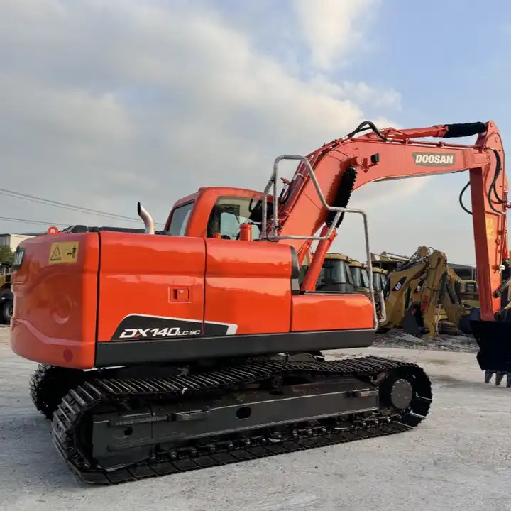Used 14ton Durable Medium Type Grab Shovel Doosan Dx140LC-9c Dx150LC Dx1200 Digger Machinery Crawler Hydraulic Excavator - Гусеничный экскаватор: фото 1 Used 14ton Durable Medium Type Grab Shovel Doosan Dx140LC-9c Dx150LC Dx1200 Digger Machinery Crawler Hydraulic Excavator - Гусеничный экскаватор: фото 1