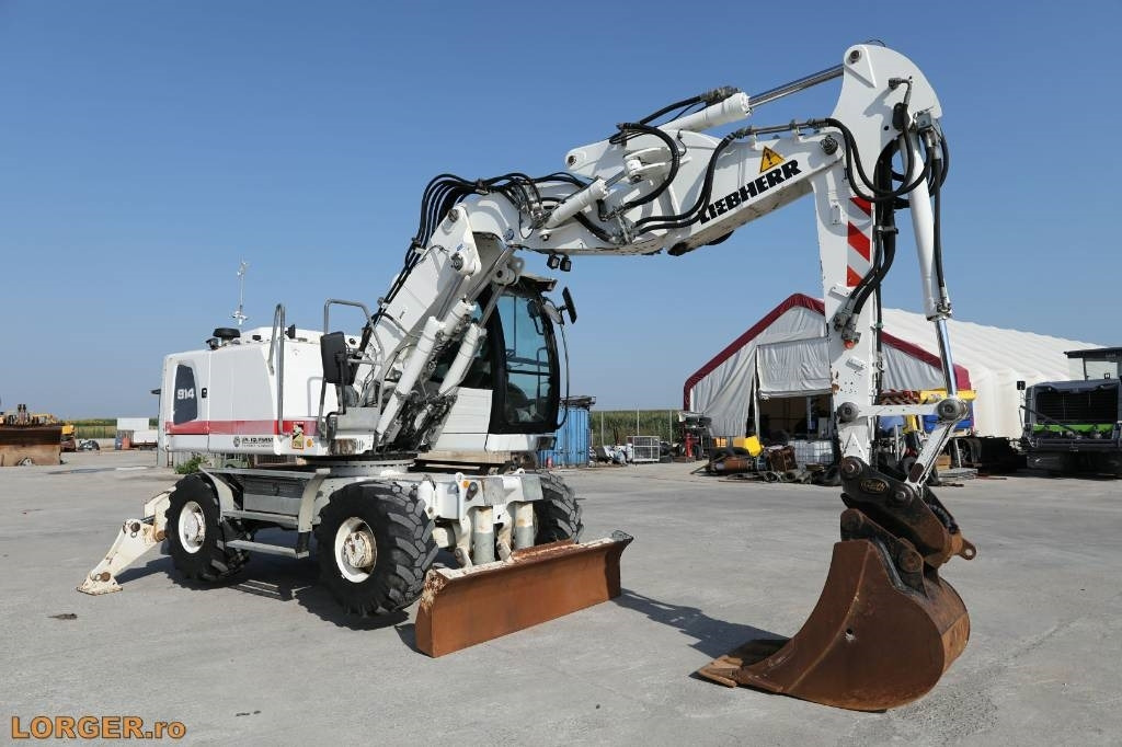Liebherr A 914 - Колёсный экскаватор: фото 1 Liebherr A 914 - Колёсный экскаватор: фото 1