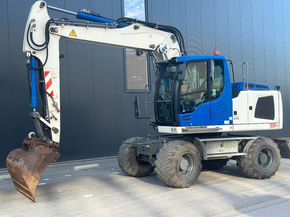 Liebherr A914 - Колёсный экскаватор: фото 1 Liebherr A914 - Колёсный экскаватор: фото 1