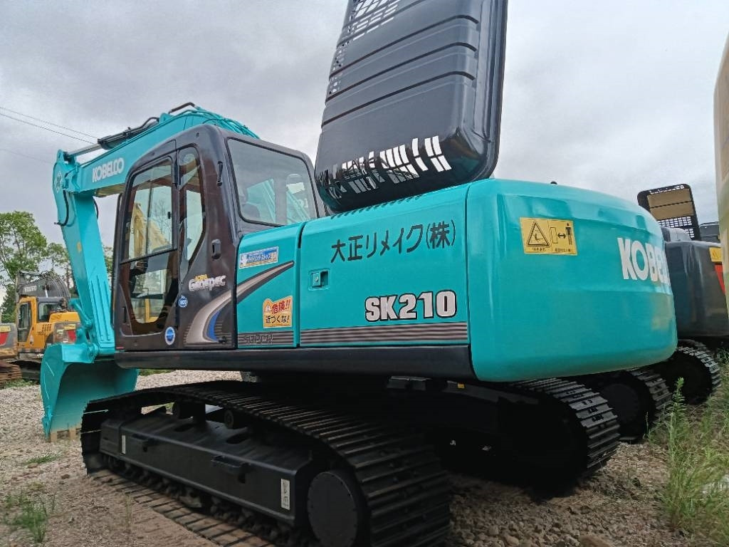 Kobelco SK 210 - Гусеничный экскаватор: фото 1 Kobelco SK 210 - Гусеничный экскаватор: фото 1