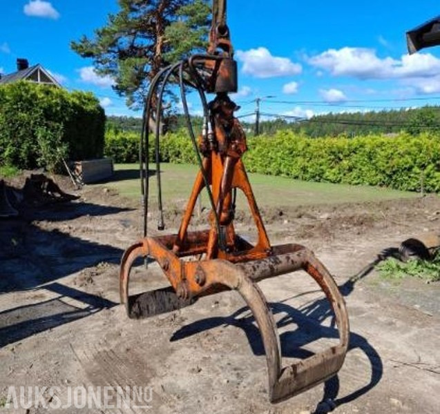 Tømmerklo med rotator - Stått på Hiab 670 - Навесное оборудование для Строительной техники: фото 1 Tømmerklo med rotator - Stått på Hiab 670 - Навесное оборудование для Строительной техники: фото 1