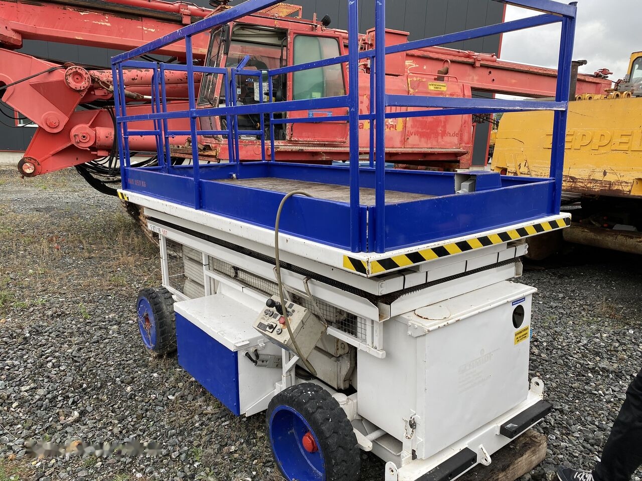 Bluelift NACELA LIFT TKD HL 80 EV / Electrica / 9,7 m / 850 kg - Ножничный подъемник: фото 1 Bluelift NACELA LIFT TKD HL 80 EV / Electrica / 9,7 m / 850 kg - Ножничный подъемник: фото 1