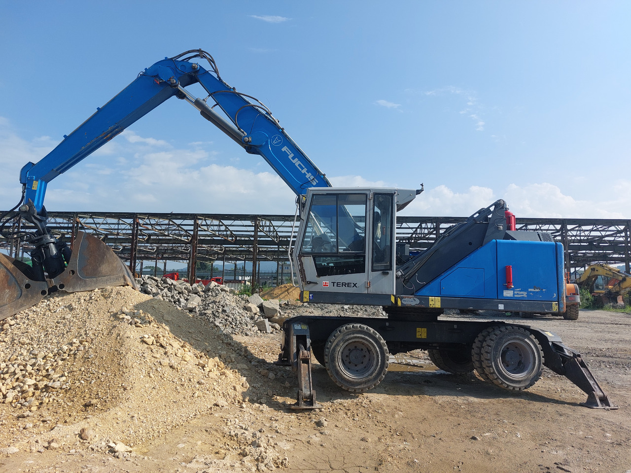 FUCHS MHL320 - Перегружатель: фото 1