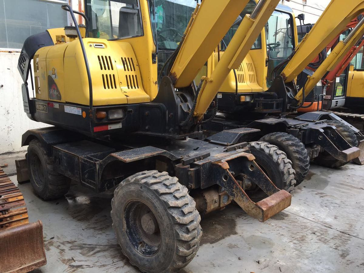 Doosan 60w-7 - Колёсный экскаватор: фото 1 Doosan 60w-7 - Колёсный экскаватор: фото 1