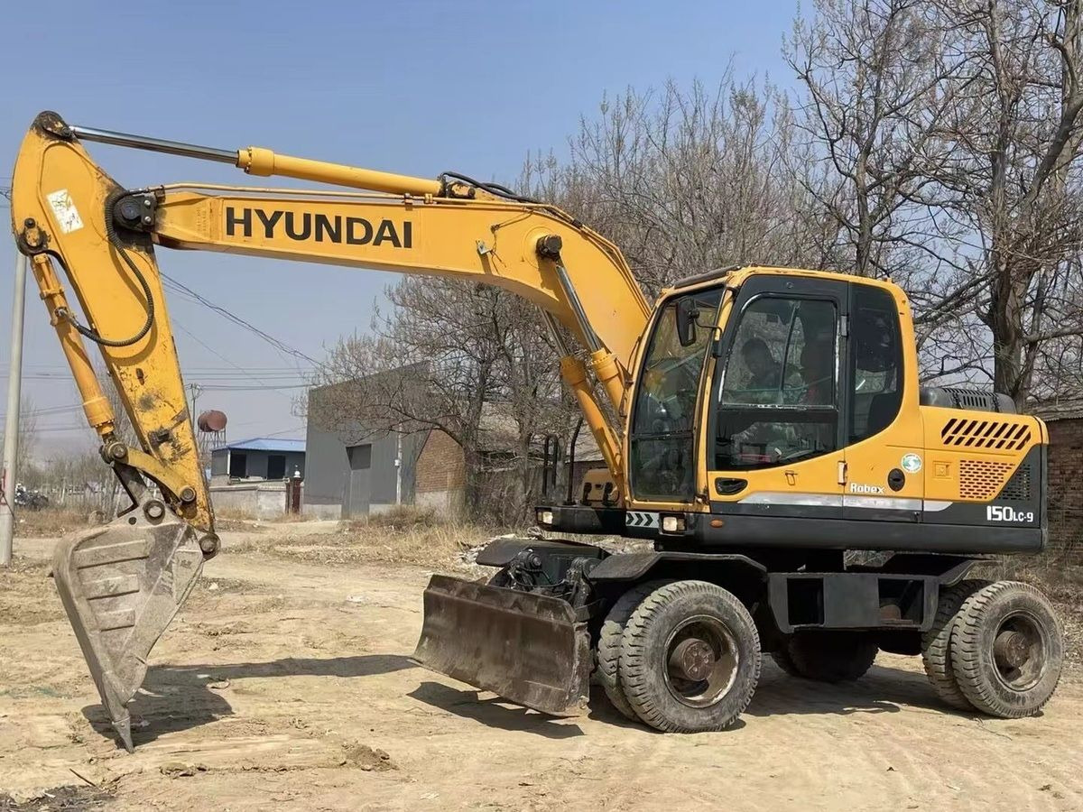 Hyundai 150-9 - Колёсный экскаватор: фото 1 Hyundai 150-9 - Колёсный экскаватор: фото 1