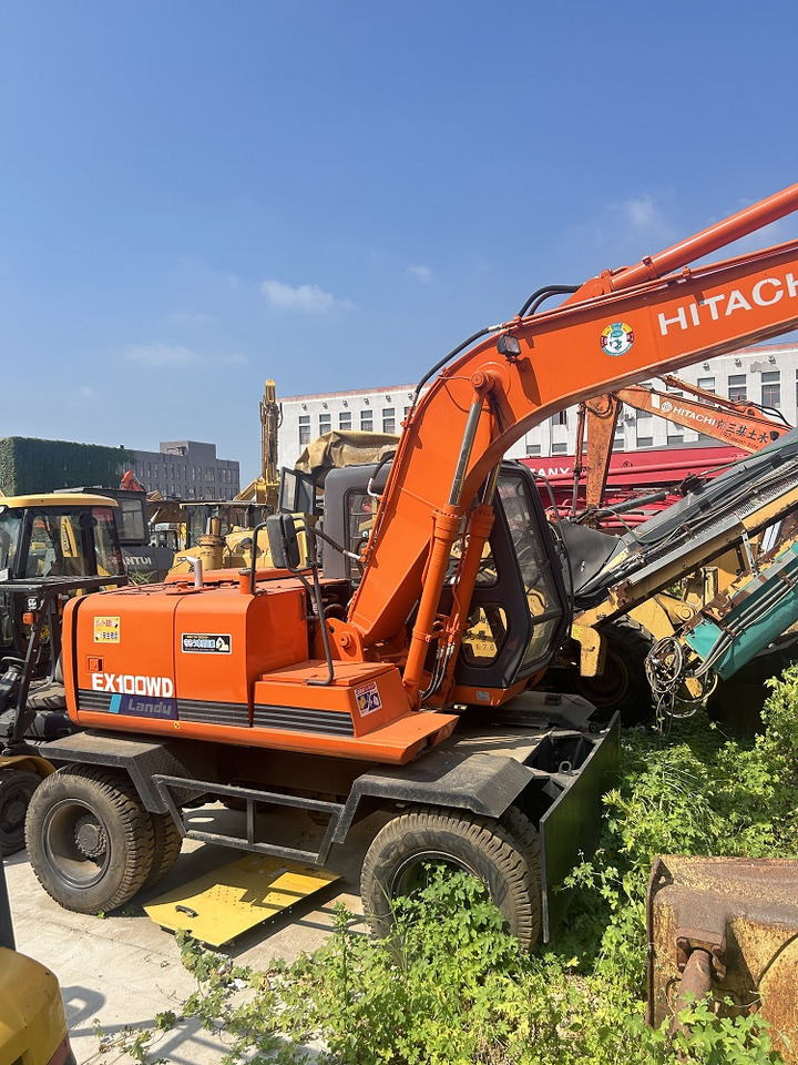 HITACHI Hitachi EX100WD wheel excavator - Колёсный экскаватор: фото 1 HITACHI Hitachi EX100WD wheel excavator - Колёсный экскаватор: фото 1