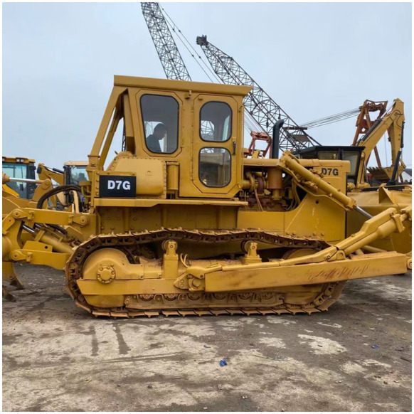 Fast delivery and low working conditions Used CAT bulldozer D7G Second-hand Caterpillar Bulldozer D7G in stock - Бульдозер: фото 1 Fast delivery and low working conditions Used CAT bulldozer D7G Second-hand Caterpillar Bulldozer D7G in stock - Бульдозер: фото 1