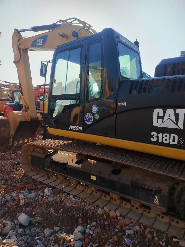 CAT 318 - Гусеничный экскаватор: фото 1 CAT 318 - Гусеничный экскаватор: фото 1