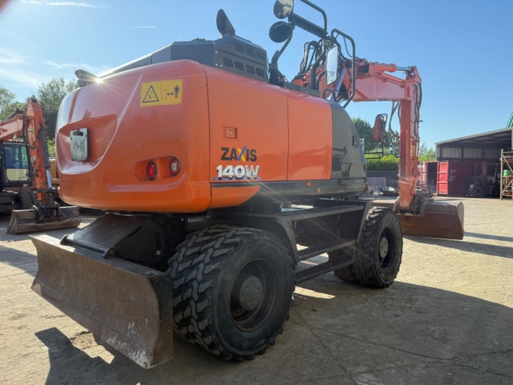 Hitachi ZX 140 WT-6 - Колёсный экскаватор: фото 4 Hitachi ZX 140 WT-6 - Колёсный экскаватор: фото 4