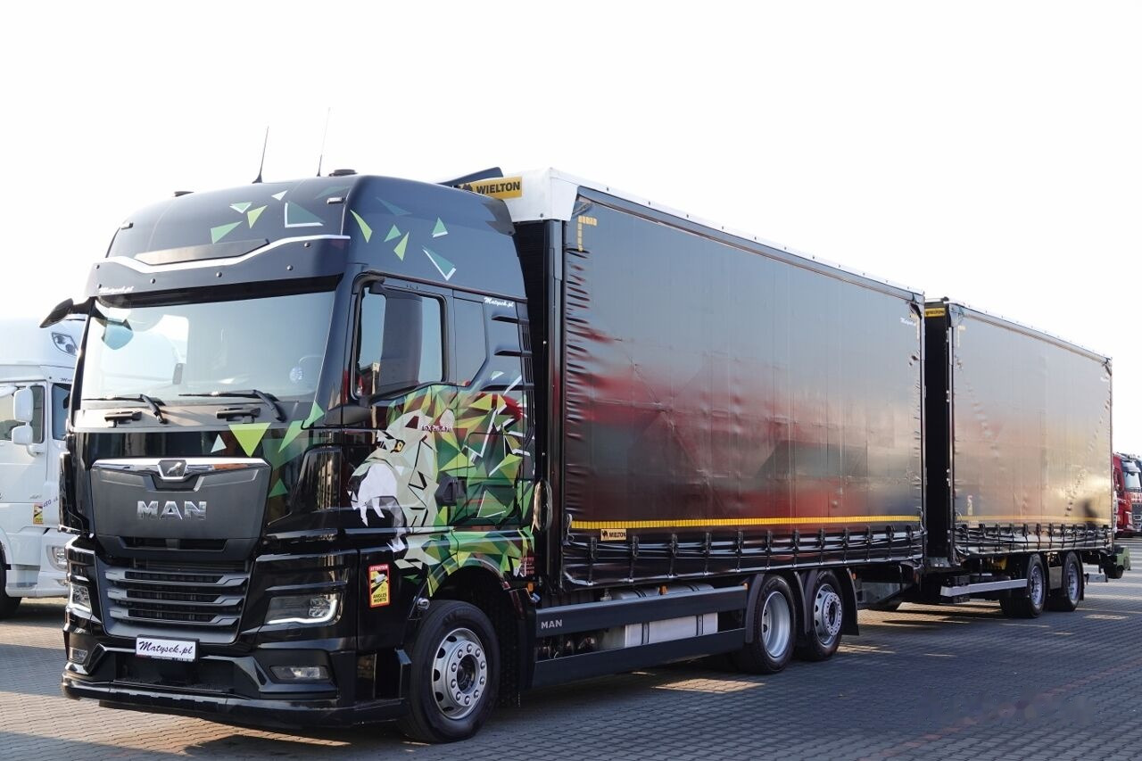 Тентованный грузовик MAN MAN TGX 26.470 / XXL / ZESTAW TANDEM PRZEJAZDOWY / 120 M3 / ZAWIESIE TGX 26.470 / XXL / ZESTAW TANDEM PRZEJAZDOWY / 120 M3 / ZAWIESIE: фото 1