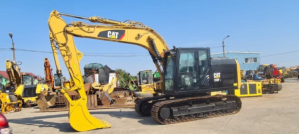 CAT 318FL - Гусеничный экскаватор: фото 1 CAT 318FL - Гусеничный экскаватор: фото 1