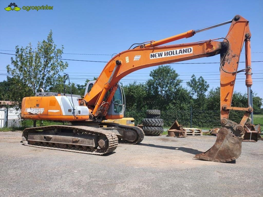 New Holland E 265 - Гусеничный экскаватор: фото 1 New Holland E 265 - Гусеничный экскаватор: фото 1