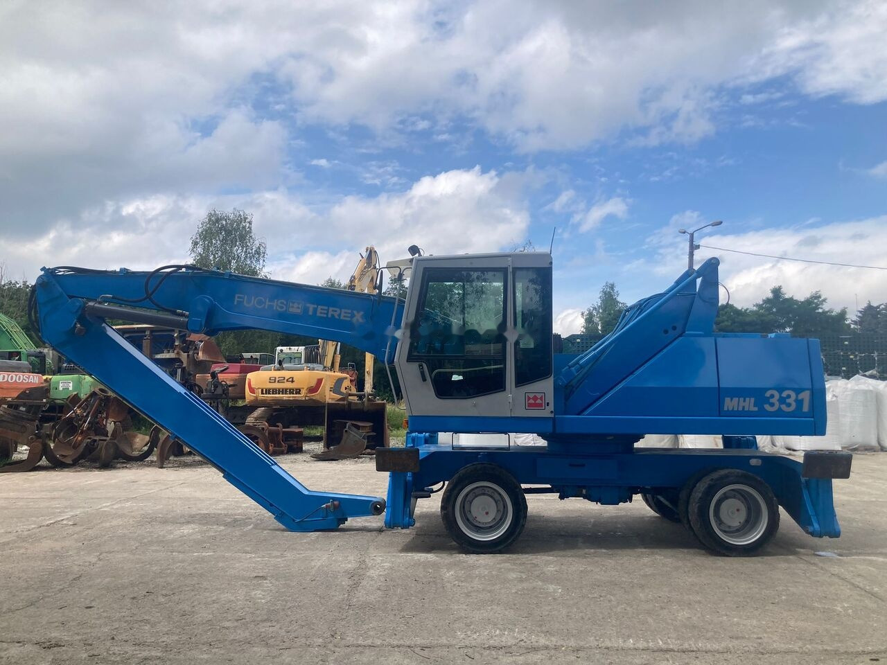 Fuchs MHL 331 C with Generator - Перегружатель: фото 1