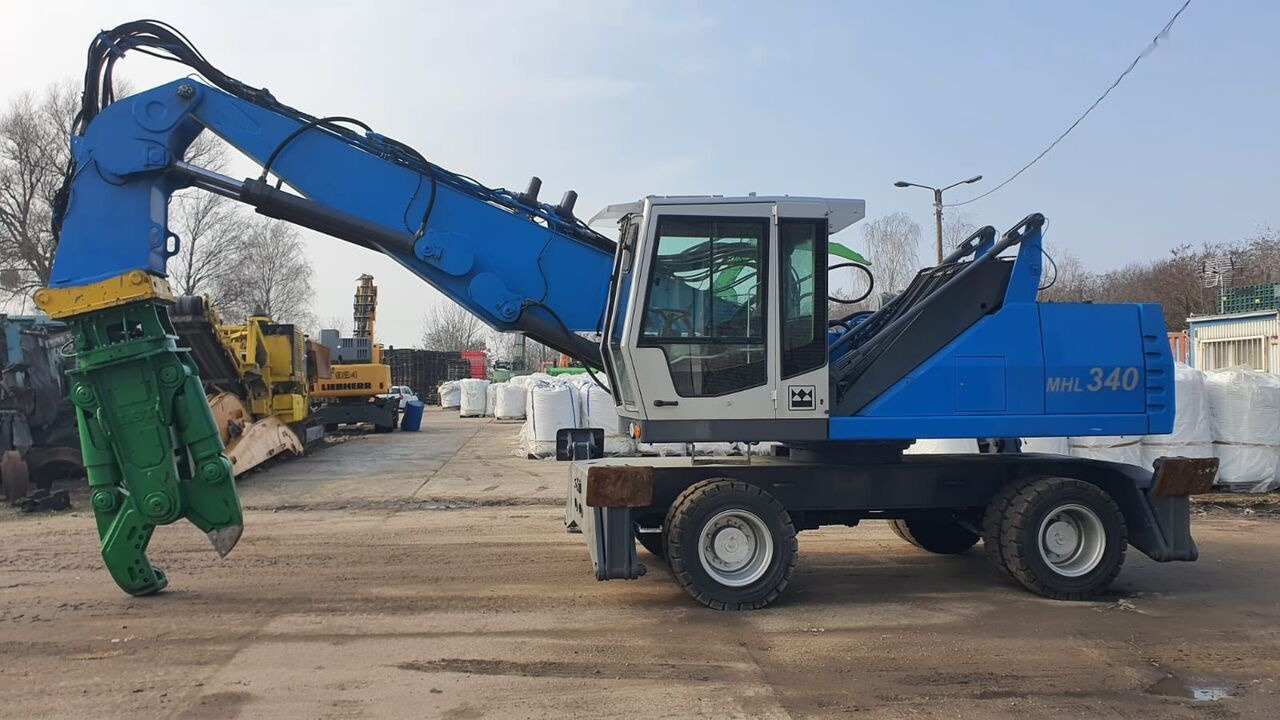 Fuchs MHL 340D FQC + LST 3to shear - Перегружатель: фото 1