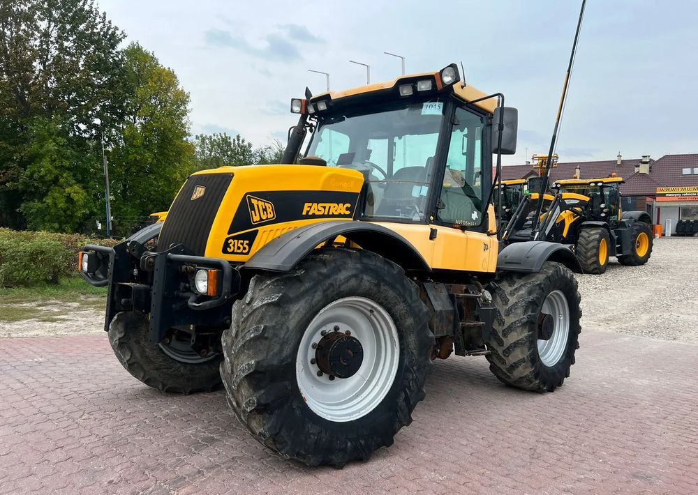 JCB Fastrac 3155 - Трактор: фото 1