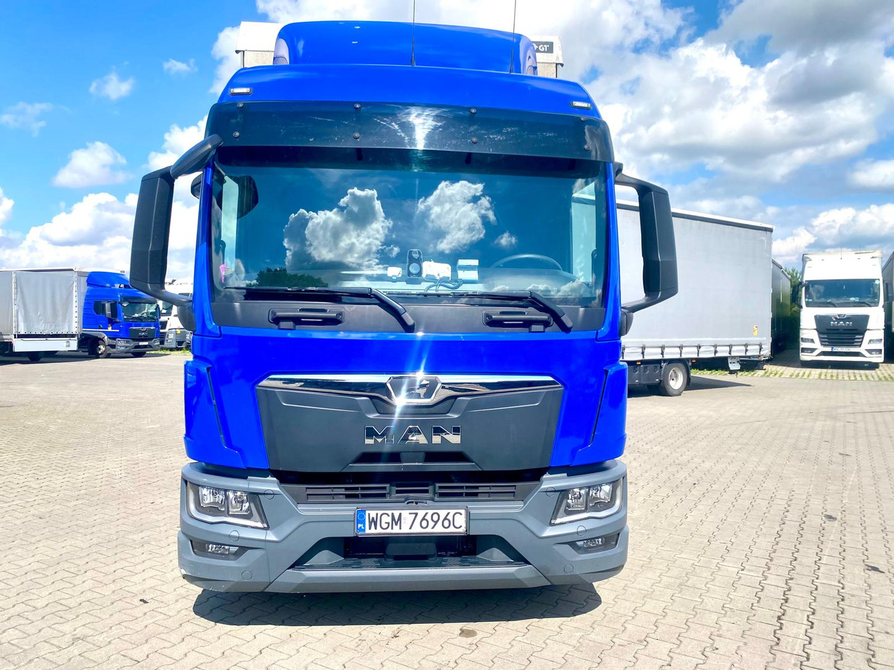 MAN Tgl - Тентованный грузовик: фото 1