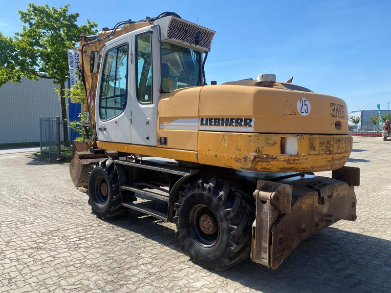 Liebherr A316 Litronic A 316 litronic - Колёсный экскаватор: фото 1 Liebherr A316 Litronic A 316 litronic - Колёсный экскаватор: фото 1