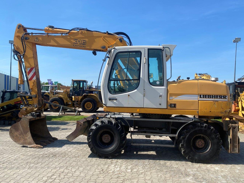 Liebherr A316 Litronic A 316 litronic - Колёсный экскаватор: фото 2 Liebherr A316 Litronic A 316 litronic - Колёсный экскаватор: фото 2
