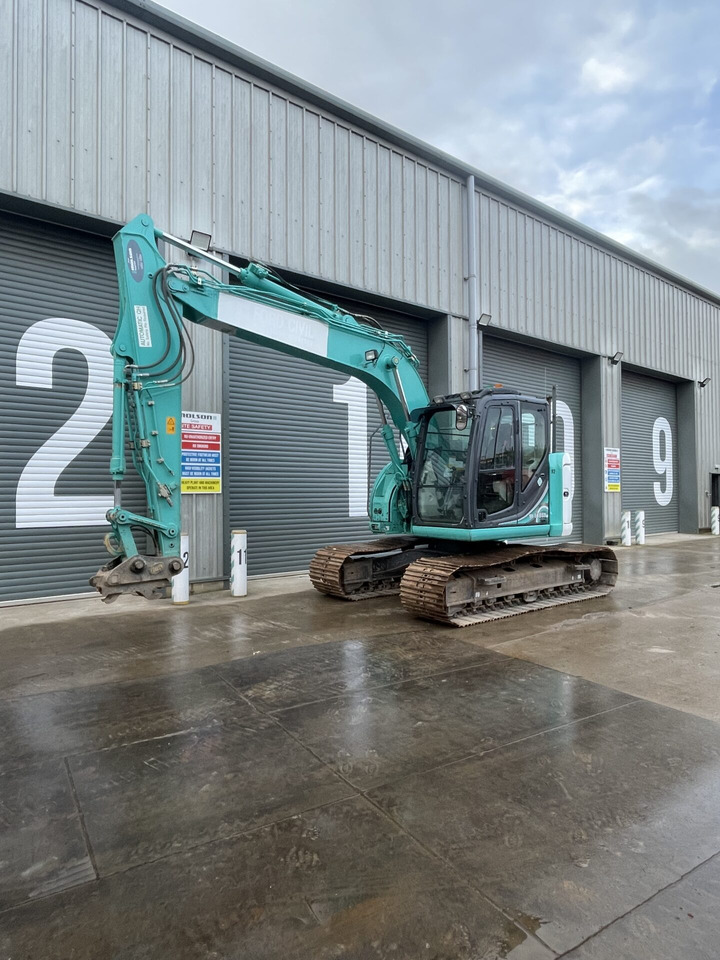 Kobelco SK140SRL-5 - Гусеничный экскаватор: фото 1 Kobelco SK140SRL-5 - Гусеничный экскаватор: фото 1