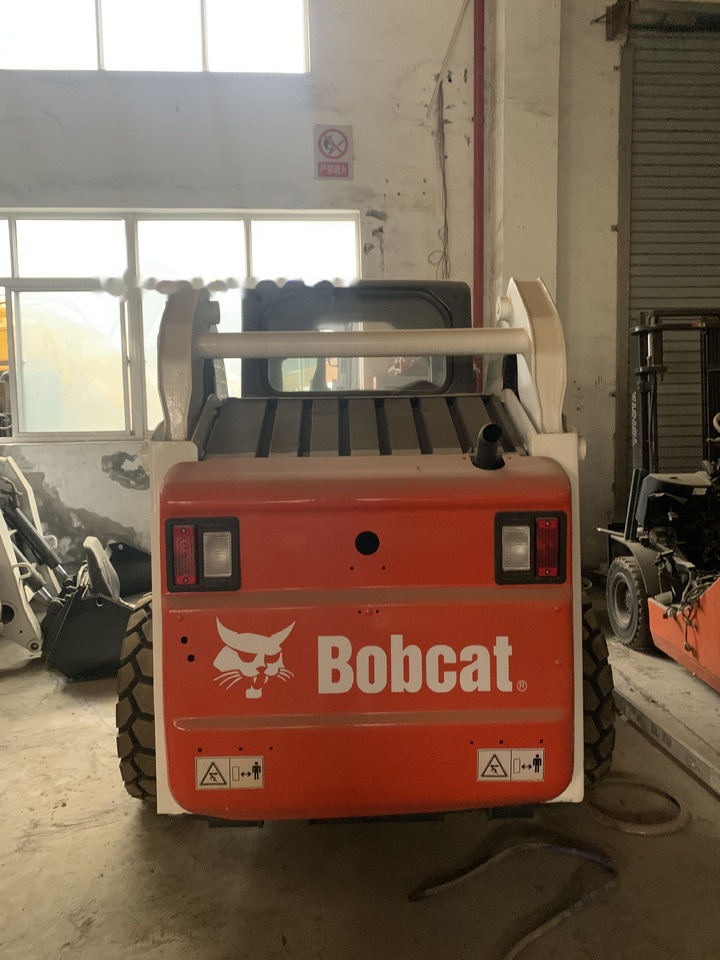 BOBCAT S185 - Мини-погрузчик с бортовым поворотом: фото 1 BOBCAT S185 - Мини-погрузчик с бортовым поворотом: фото 1