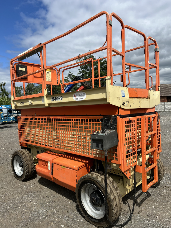 JLG M4069 - Ножничный подъемник: фото 1