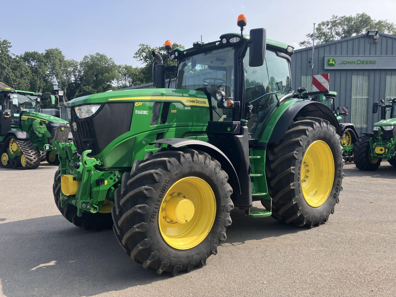 John Deere 6R 195 - Трактор: фото 1 John Deere 6R 195 - Трактор: фото 1