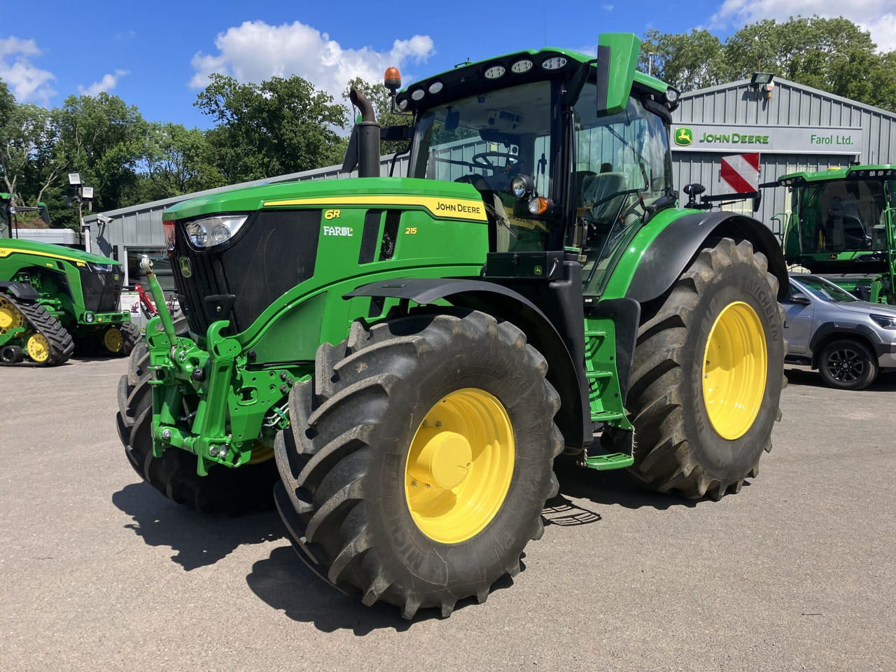 John Deere 6R 215 - Трактор: фото 1 John Deere 6R 215 - Трактор: фото 1