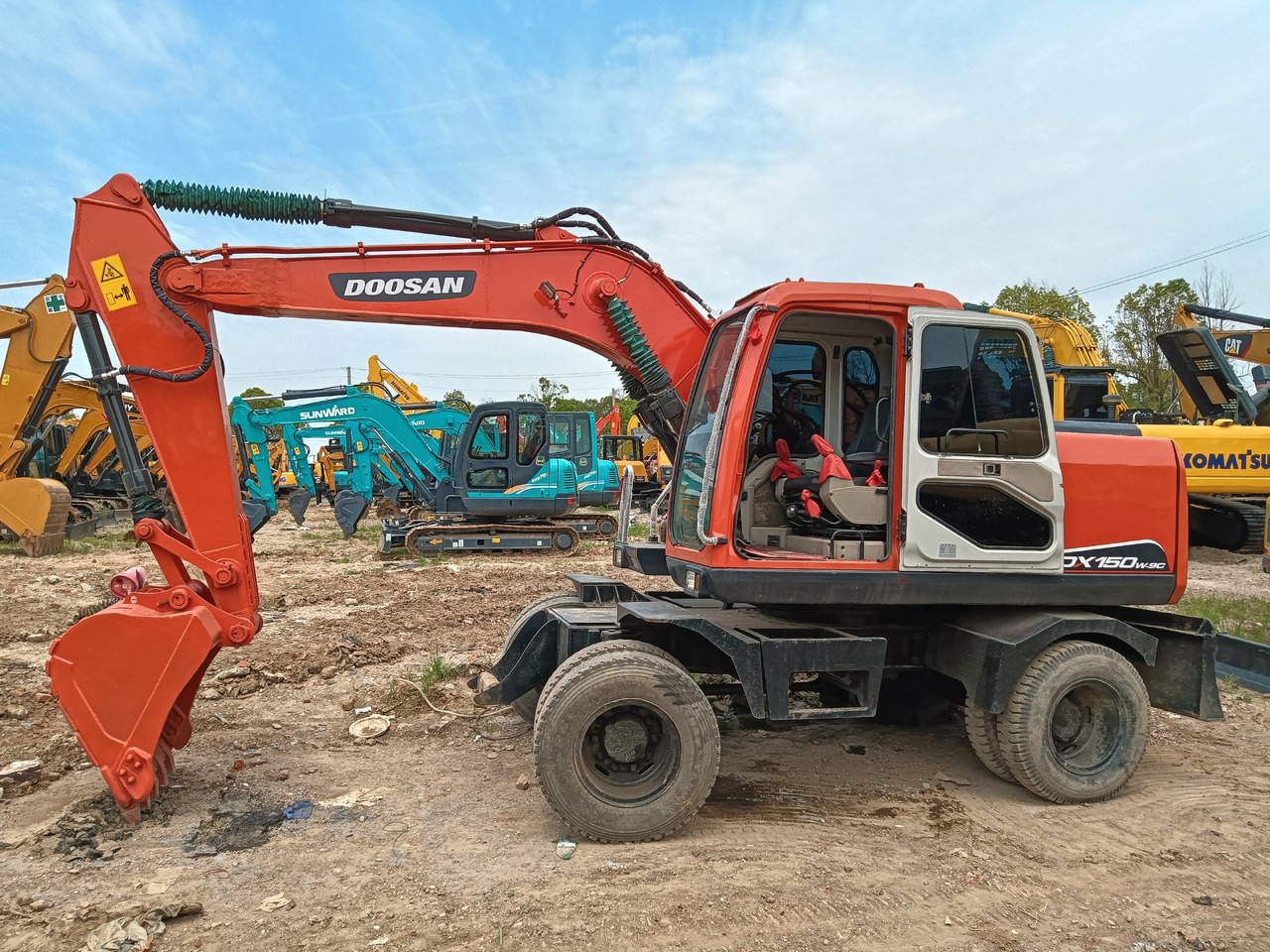 DOOSAN DX150W - Колёсный экскаватор: фото 1 DOOSAN DX150W - Колёсный экскаватор: фото 1