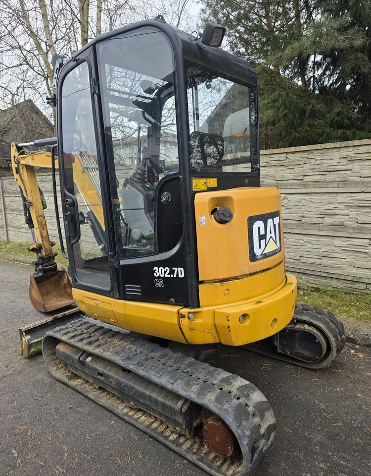 Caterpillar - Мини-экскаватор: фото 1