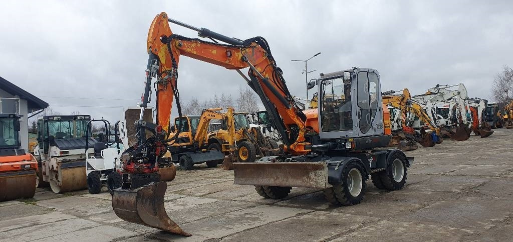 Wacker Neuson Ew100 z rototiltem  - Колёсный экскаватор: фото 1