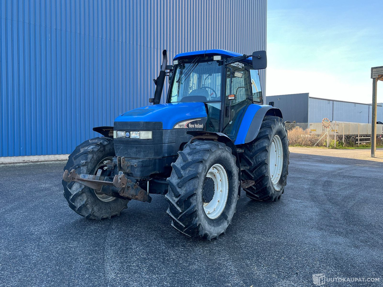 New Holland TM155, traktori etunostolaitteeella, 2004, INTEXW, Salo - Сельскохозяйственная техника: фото 1