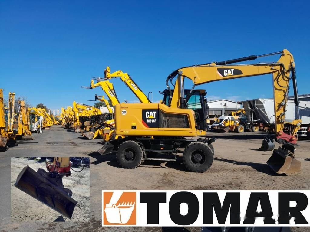 Caterpillar M 314 F - Колёсный экскаватор: фото 1