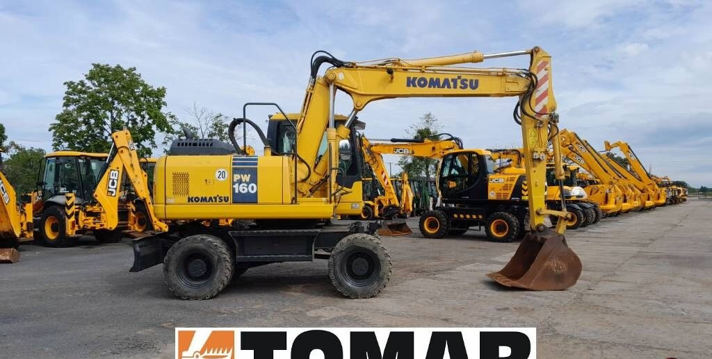 Komatsu PW 160-7 - Колёсный экскаватор: фото 1