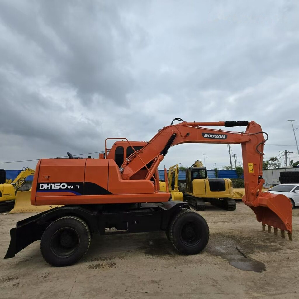 Doosan DH150W - Колёсный экскаватор: фото 1 Doosan DH150W - Колёсный экскаватор: фото 1