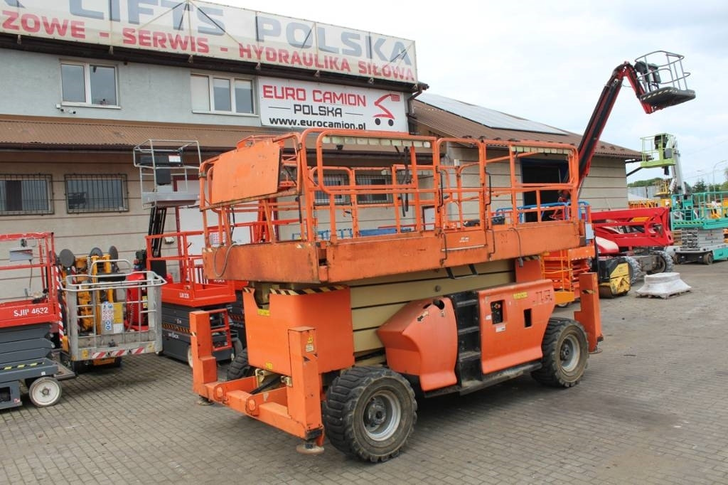 JLG 4394 RT - 15 m scissor lift diesel genie 4390 - Ножничный подъемник: фото 1 JLG 4394 RT - 15 m scissor lift diesel genie 4390 - Ножничный подъемник: фото 1