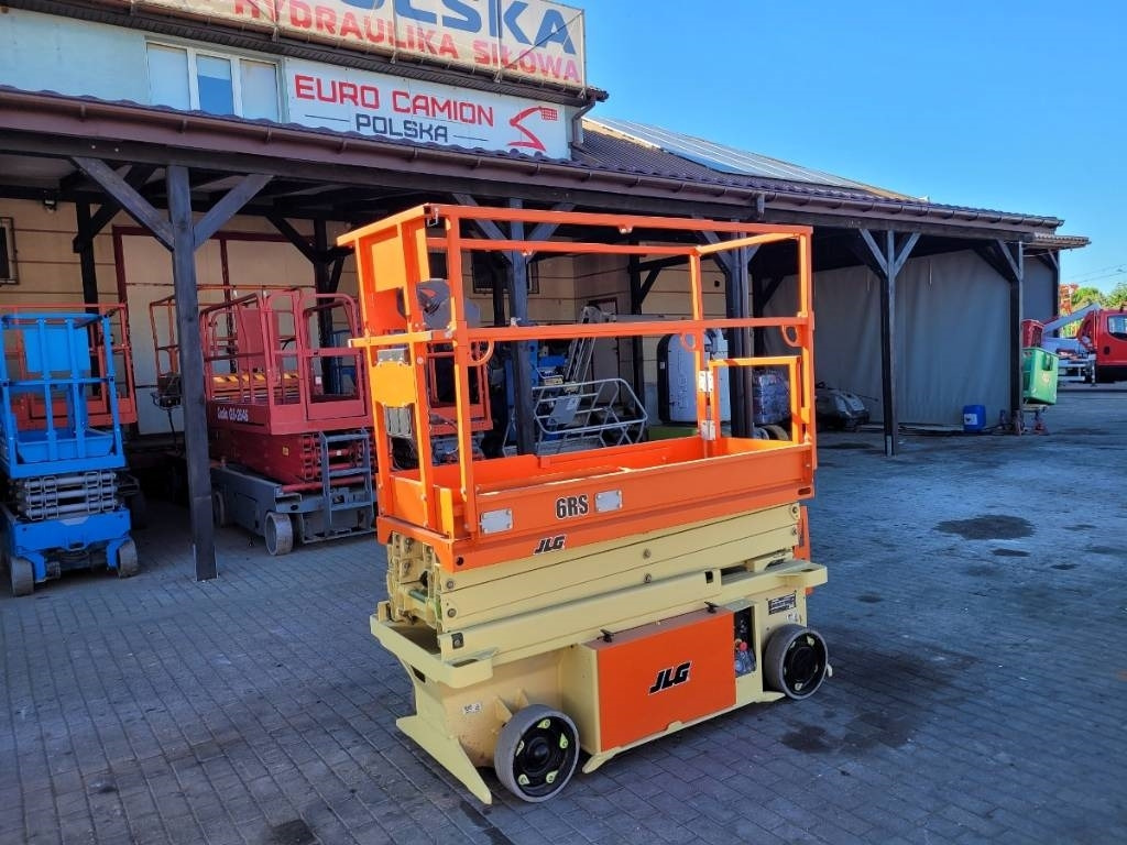 JLG 6 RS - 8 m electric scissor lift genie 1932 imer - Ножничный подъемник: фото 1 JLG 6 RS - 8 m electric scissor lift genie 1932 imer - Ножничный подъемник: фото 1