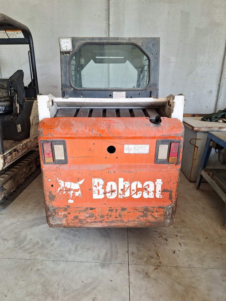 Bobcat 553 - Мини-погрузчик с бортовым поворотом: фото 1 Bobcat 553 - Мини-погрузчик с бортовым поворотом: фото 1