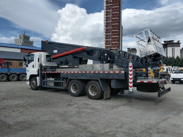 Новый Автовышка Автовышка Qingling GKS56 на шасси ISUZU 4Х2 дв 221Kw высота подъёма 56м, 2025г: фото 7