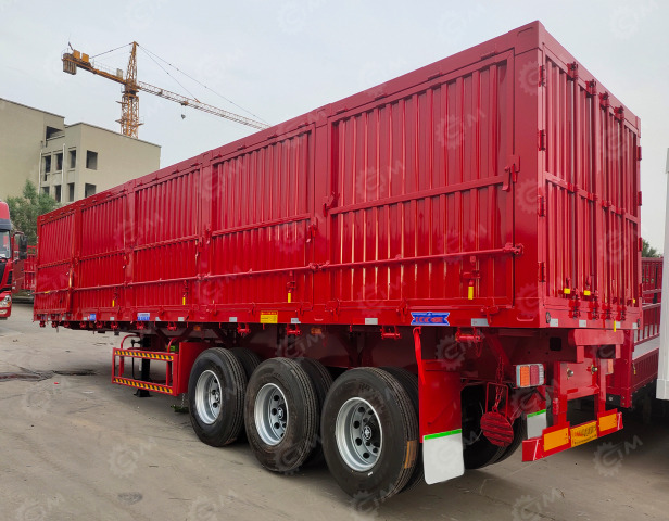 Полуприцеп самосвальный с боковой разгрузкой LUXUDA 3 оси FUWA г/п 43т (рессоры) - Самосвальный полуприцеп: фото 1 Полуприцеп самосвальный с боковой разгрузкой LUXUDA 3 оси FUWA г/п 43т (рессоры) - Самосвальный полуприцеп: фото 1